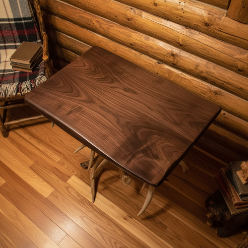 Top-down view of black walnut side table top in rustic cabin setting
